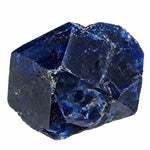 Pierre brute cristal de boléite du Mexique, minéral bleu indigo aux cristaux cubiques et aux reflets métalliques
