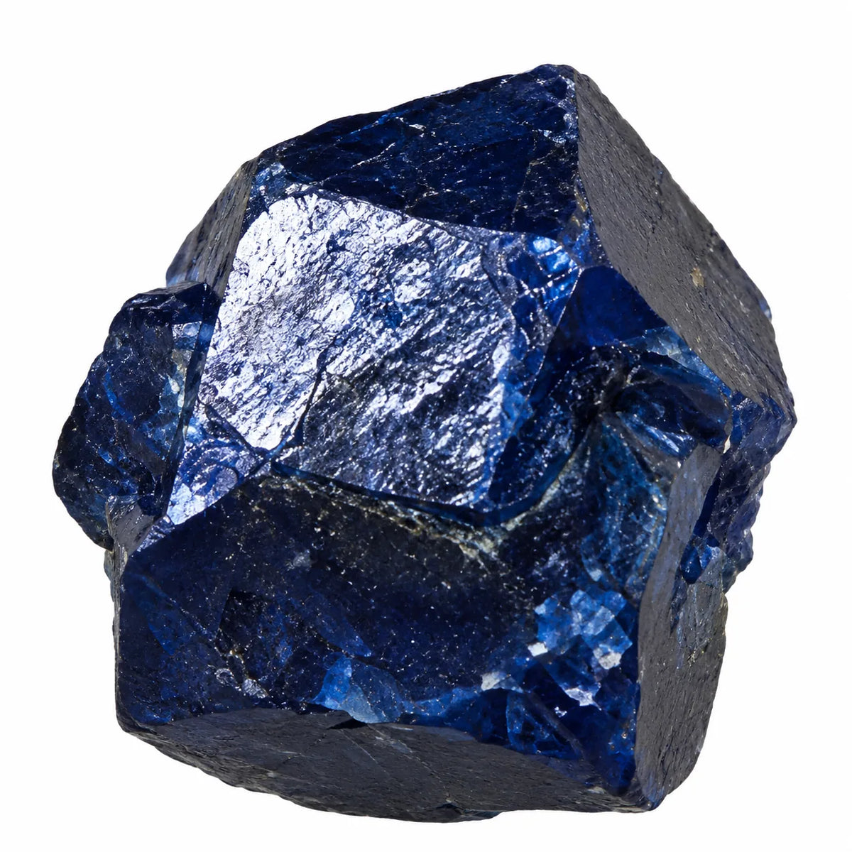 Cristal de boléite brut du Mexique, pierre minérale bleu nuit présentant des facettes naturelles, des fractures et des éclats bleu cobalt