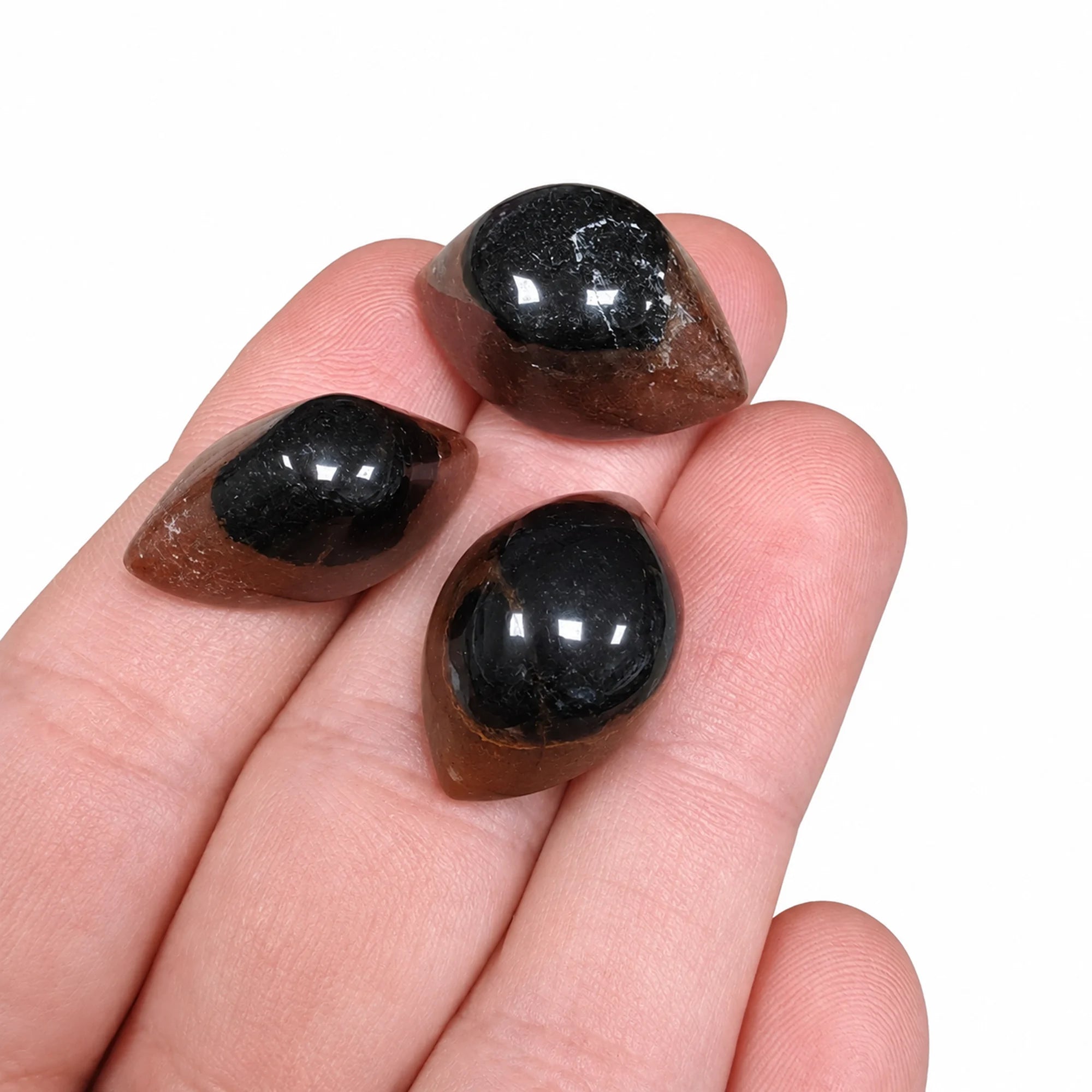 Pierre Sardonyx Œil de Shiva naturelle – trois pierres roulées polies présentées dans la main