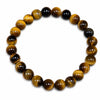 Bracelet Œil de tigre véritable en perles rondes naturelles de 8 mm sur fond blanc, bijou en pierre naturelle aux reflets dorés et bruns, élastique, idéal pour la lithothérapie et le quotidien.