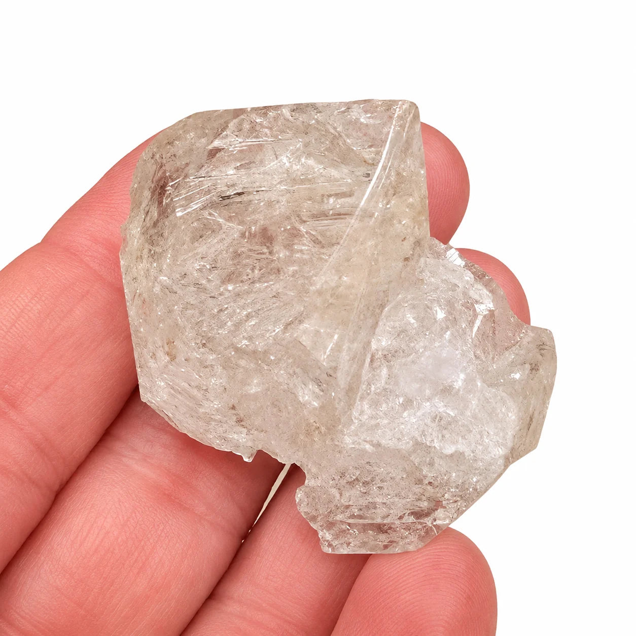 Pierre de collection Quartz fenêtre cristal biterminé de Paredon au Mexique présentée en main pour apprécier la taille, la transparence et la qualité du cristal naturel.