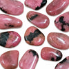 Pierre roulée Rhodonite du Brésil avec Psilomélane