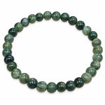 Bracelet en serpentine présenté en cercle sur fond blanc, alternant perles vert olive, vert pâle et vert profond